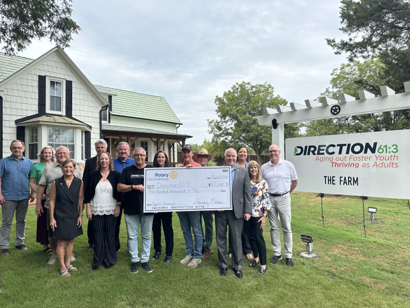 McKinney Rotary presenting a check to Direction61:3